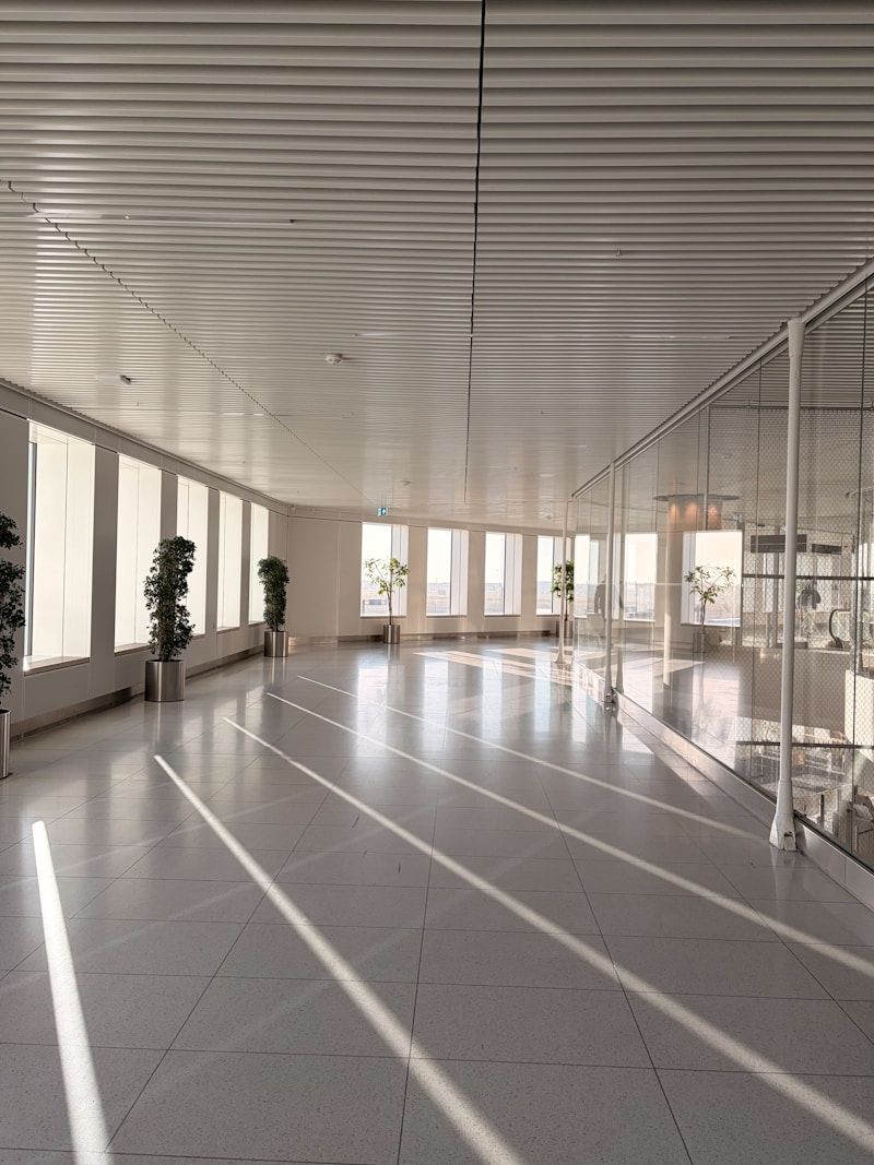 Sunlight across a modern empty hallway