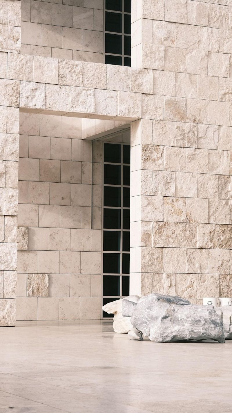 Stone building facade with tall windows